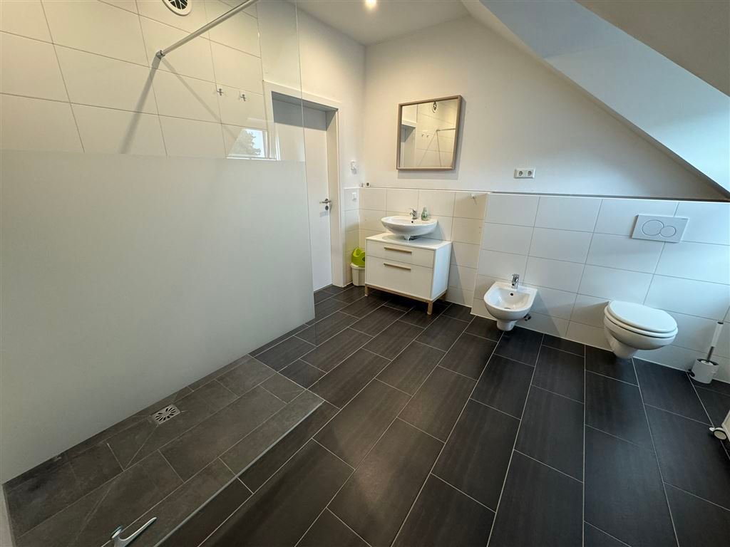 Moderne Doppelhaushälfte mit KFW 55  Standard und umfassender Ausstattung  in Bielefeld Schröttinghausen