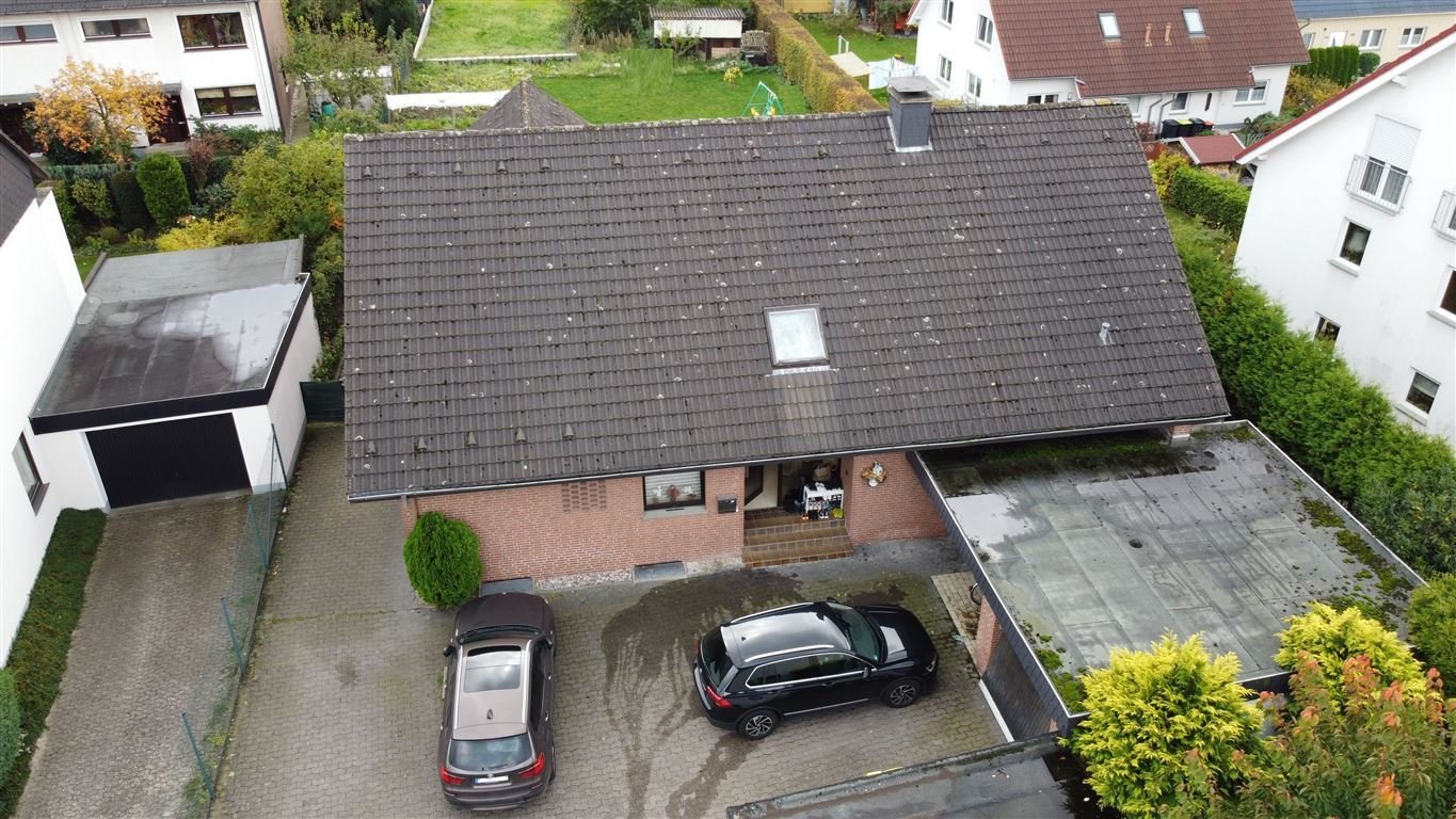 Charmantes Einfamilienhaus mit  Einliegerwohnung und Baugrundstück  mit viel Platz für Ihre Ideen. 