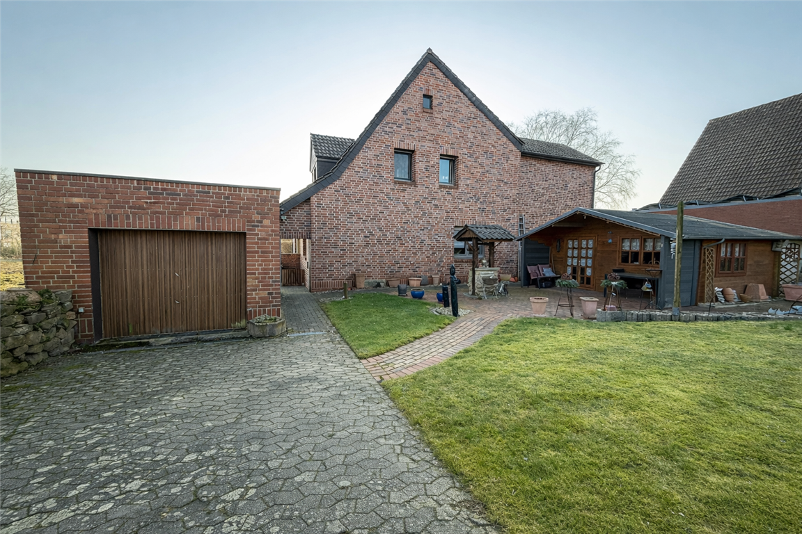 Einfamilienhaus mit großem  Grundstück, zwei Garagen und  vielseitigem Platzangebot in Hörstel Riesenbeck